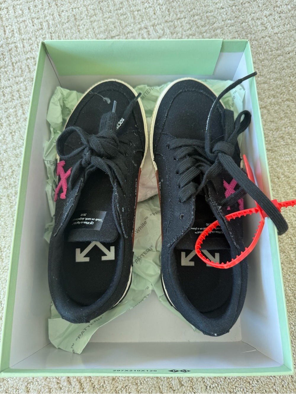 Off-White Black Canvas Low-Top Sneakers with Pink Accent and Red Zip Tie
